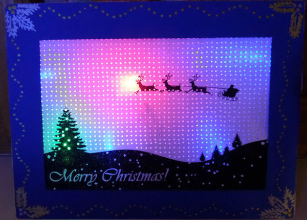 Have an LED back-lit pin hole Christmas card!