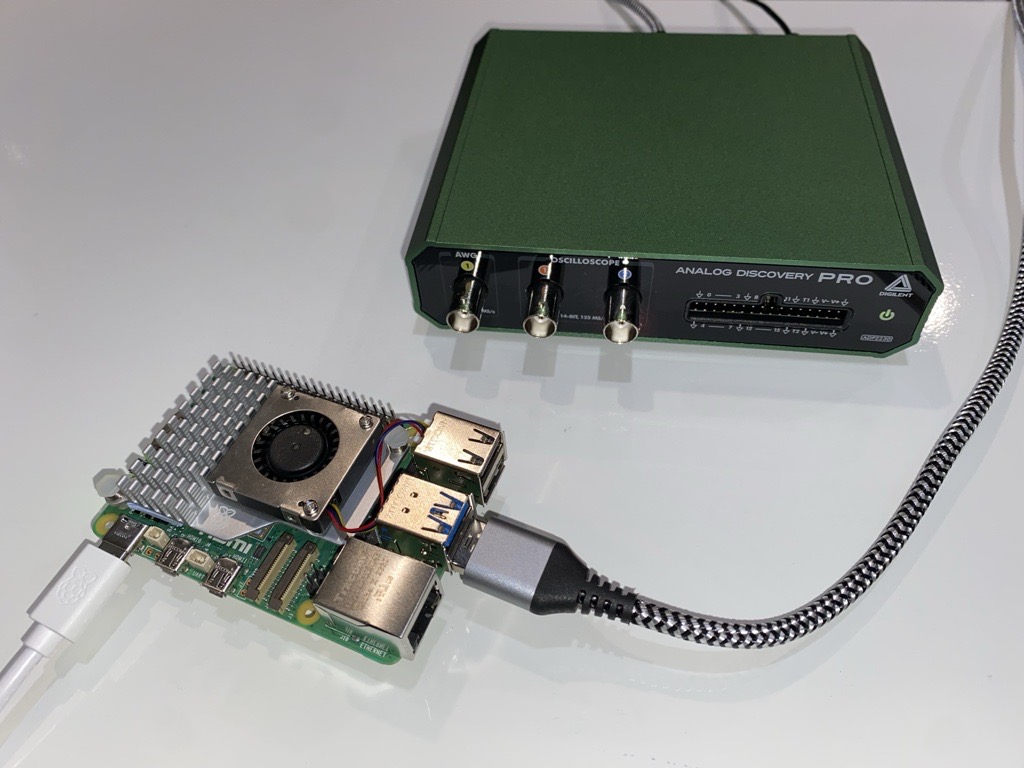 Figure 1. Raspberry Pi 5 with active cooler connected to an Analog Discovery Pro (ADP2230) using an USB-A to USB-C 3.2 Gen 2 cable 