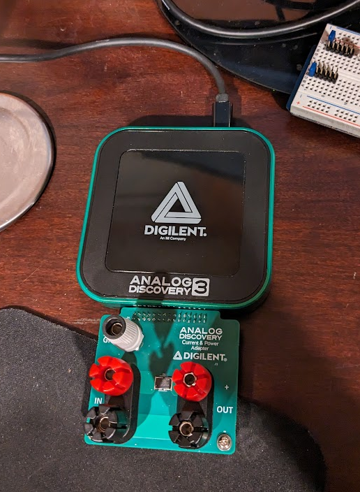 Connect the Current and Power Adapter to your compatible Analog Discovery device.